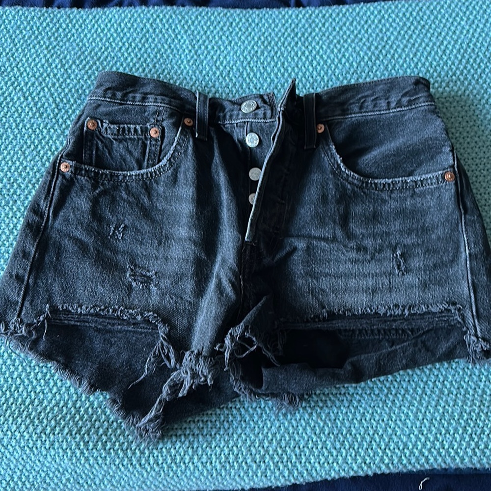 Levi’s 501 jean shorts fit like size 25 but stretchy. Gently worn